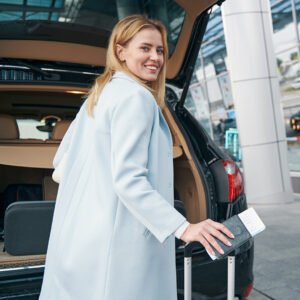 Traveler at San Francisco airport getting ready to use limousine service, ensuring a smooth and comfortable ride. SFO limo service